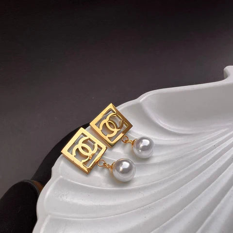 Elegant Pearl Top Stainless Steel Channel Earrings – Premium Quality - Stainless Steel - Channel logo