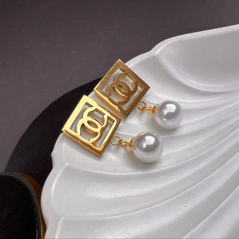 Elegant Pearl Top Stainless Steel Channel Earrings – Premium Quality - Stainless Steel - Channel logo
